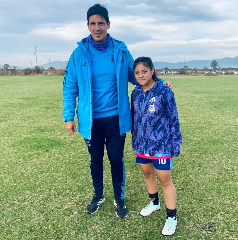 Emi con el seleccionador nacional, Germán Portanova.