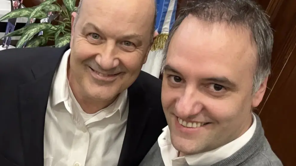 Federico Sturzenegger y Manuel Adorni