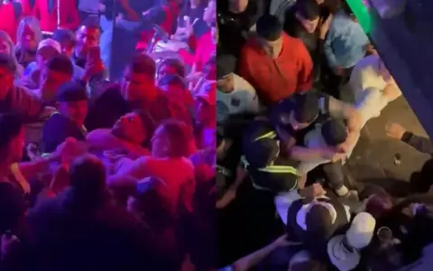 Momento en que retienen al exmediocampista y lo sacan del lugar.