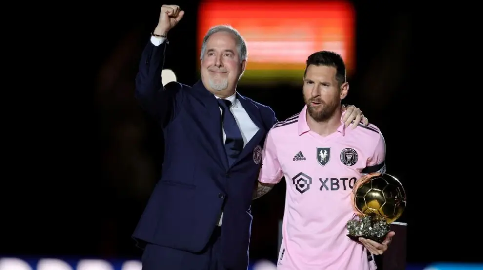 Jorge Mas y Lionel Messi.